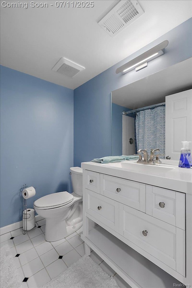 2403 Red Maple Ct, Troy, MI 48098 - bathroom featuring vanity, tile patterned floors, and a shower with curtain