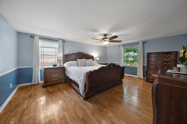 4550 Comanche Dr, Okemos, MI 48864 - bedroom featuring wood finished floors and ceiling fan