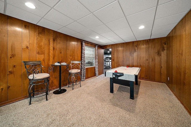 4550 Comanche Dr, Okemos, MI 48864 - game room with wooden walls, recessed lighting, and carpet flooring