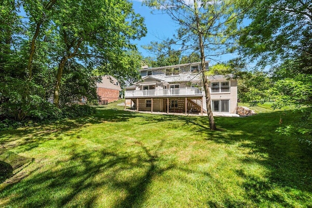 4550 Comanche Dr, Okemos, MI 48864 - back of house with a wooden deck, stairs, and a yard