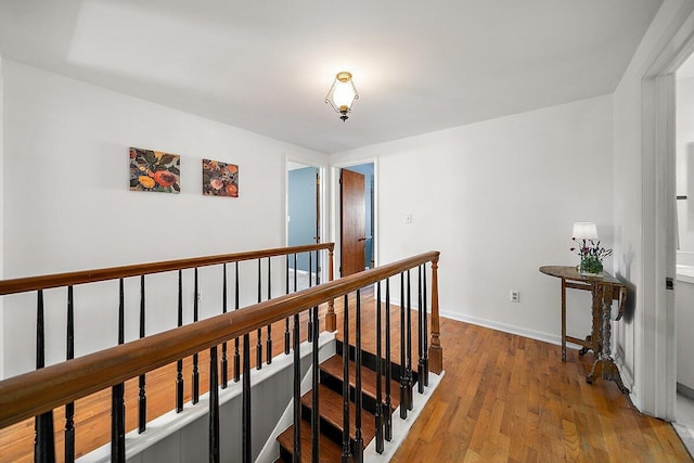 4550 Comanche Dr, Okemos, MI 48864 - hall featuring an upstairs landing and light wood-type flooring