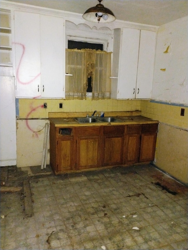 3203 Buena Vista St, Detroit, MI 48238 - kitchen featuring white cabinets and tile patterned floors