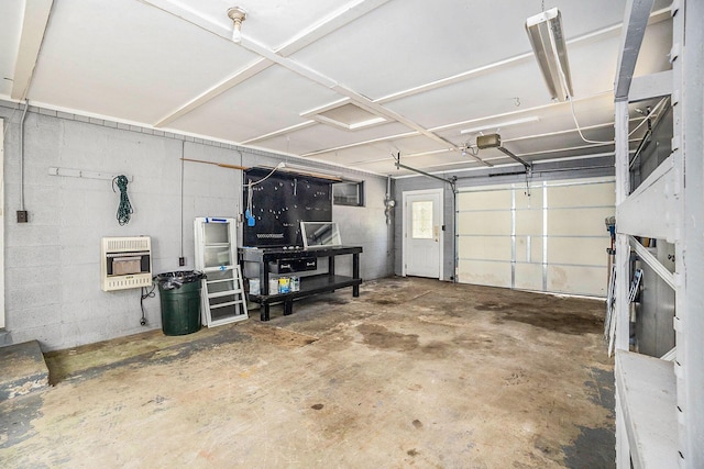 193 S Emerson Dr, Branch, MI 49402 - garage featuring heating unit and a garage door opener