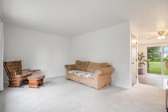 3128 Maurer Rd, Charlotte, MI 48813 - living room with carpet flooring and ceiling fan