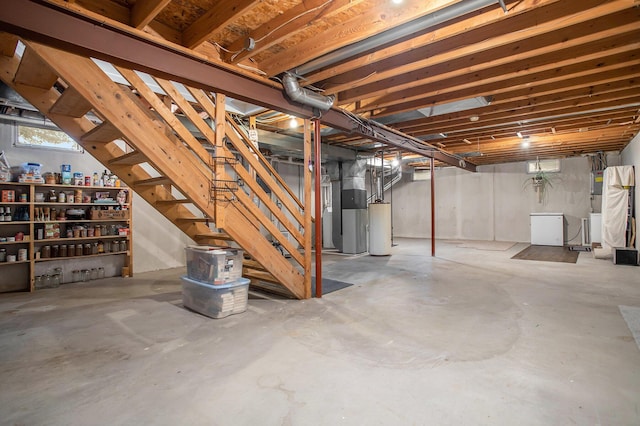 3128 Maurer Rd, Charlotte, MI 48813 - basement with stairs, heating unit, and gas water heater