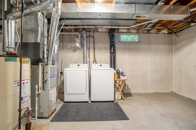 3128 Maurer Rd, Charlotte, MI 48813 - basement with gas water heater and independent washer and dryer