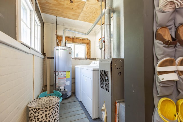 1620 Ontario Rd, Niles, MI 49120 - laundry area with water heater, independent washer and dryer, and light wood-style flooring