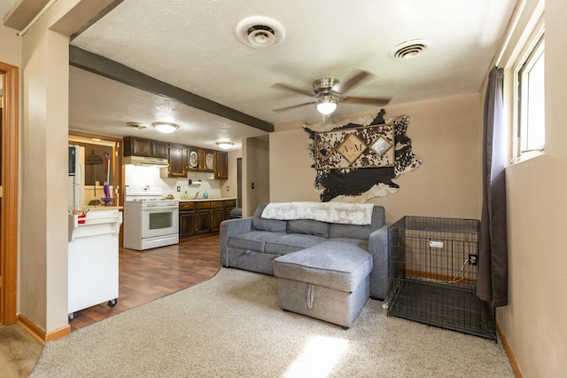 1620 Ontario Rd, Niles, MI 49120 - living room with a ceiling fan and dark wood-style flooring