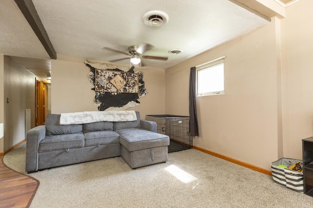 1620 Ontario Rd, Niles, MI 49120 - carpeted living room with ceiling fan and a textured ceiling