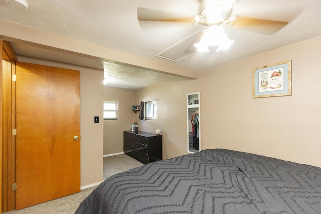 1620 Ontario Rd, Niles, MI 49120 - bedroom with carpet, a spacious closet, ceiling fan, and attic access