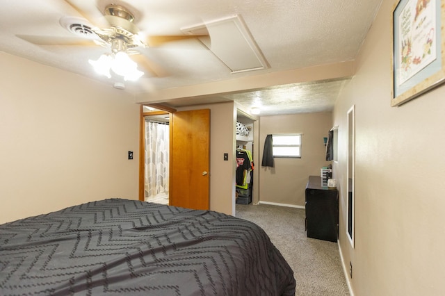 1620 Ontario Rd, Niles, MI 49120 - bedroom featuring attic access, carpet, a ceiling fan, a closet, and a textured ceiling