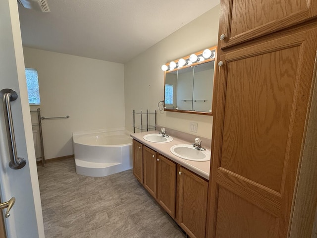 7826 Sunset Shores Dr Unit 43, Canadian Lakes, MI 49346 - full bath with a bath, double vanity, and plenty of natural light