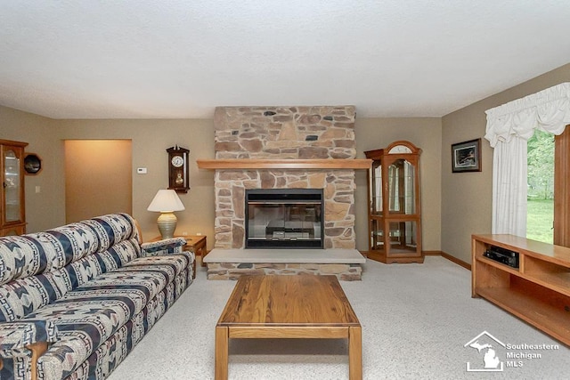 5237 Emerson Dr, Ottawa Lake, MI 49267 - carpeted living room with a stone fireplace and baseboards