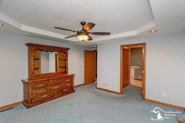 5237 Emerson Dr, Ottawa Lake, MI 49267 - bedroom with carpet floors, a raised ceiling, a textured ceiling, and a ceiling fan