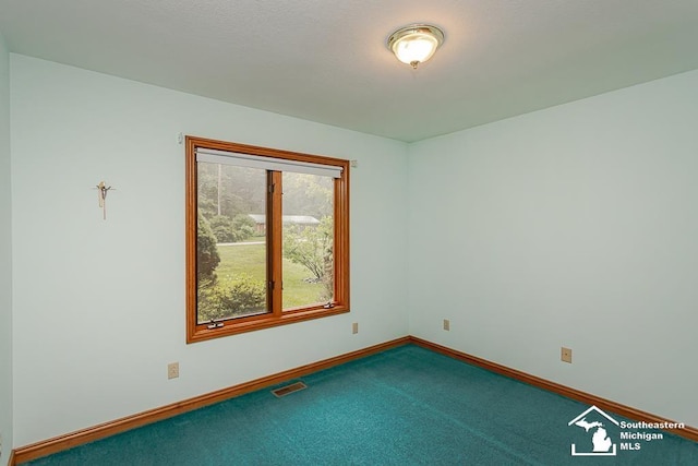 5237 Emerson Dr, Ottawa Lake, MI 49267 - carpeted empty room with baseboards