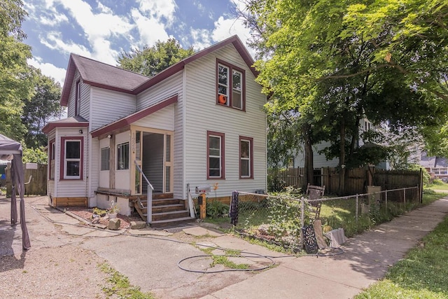 1228 Wells Pl, Kalamazoo, MI 49001 - victorian house with entry steps