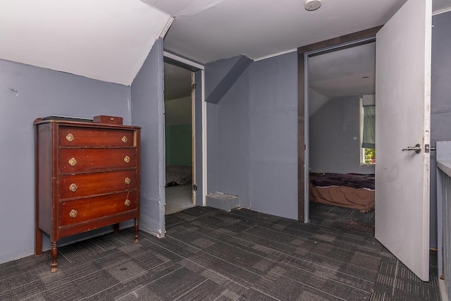 1228 Wells Pl, Kalamazoo, MI 49001 - bedroom featuring carpet and vaulted ceiling