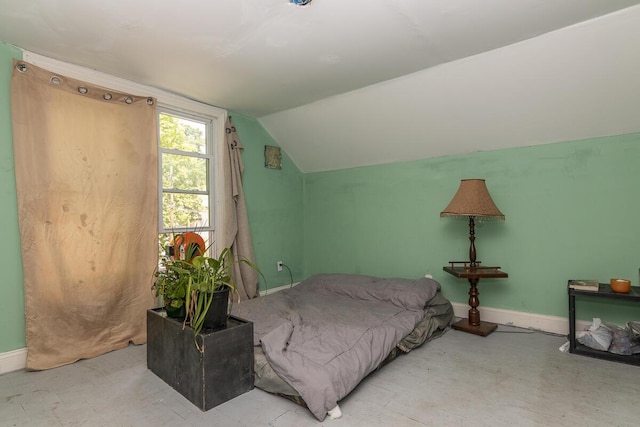 1228 Wells Pl, Kalamazoo, MI 49001 - bedroom with vaulted ceiling and baseboards