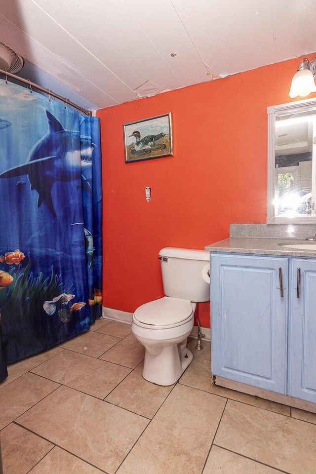 1228 Wells Pl, Kalamazoo, MI 49001 - bathroom featuring vanity, tile patterned floors, and a shower with curtain
