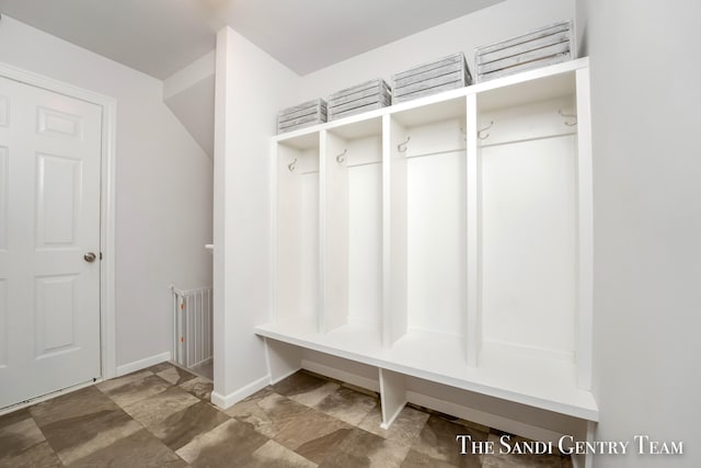 568 N River Hills Dr, Newaygo, MI 49337 - mudroom with baseboards and stone finish flooring