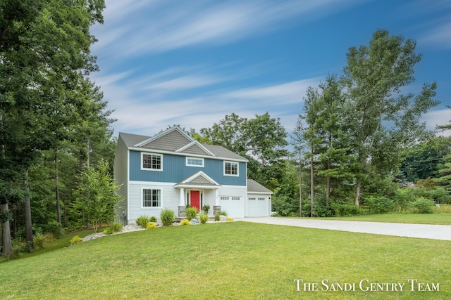 568 N River Hills Dr, Newaygo, MI 49337 - view of front of house featuring concrete driveway and a front yard