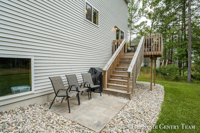 568 N River Hills Dr, Newaygo, MI 49337 - view of patio / terrace featuring stairway and a wooden deck