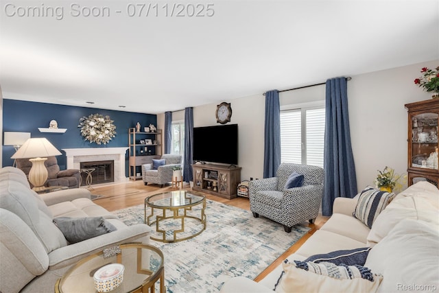 2661 Nottingham, Waterford, MI 48329 - living area featuring wood finished floors and a premium fireplace