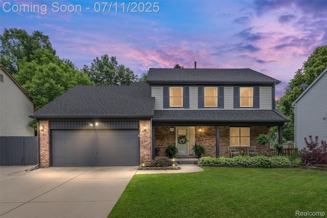 2661 Nottingham, Waterford, MI 48329 - traditional-style house with concrete driveway, a garage, brick siding, covered porch, and roof with shingles