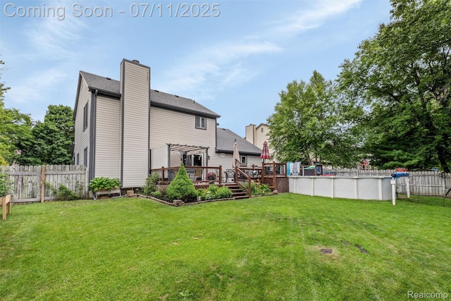 2661 Nottingham, Waterford, MI 48329 - back of property with a wooden deck, a chimney, and a shingled roof