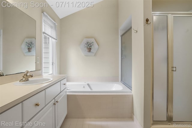 3565 Heron Ridge Dr, Rochester Hills, MI 48309 - bathroom with vanity, a shower stall, a bath, and tile patterned floors