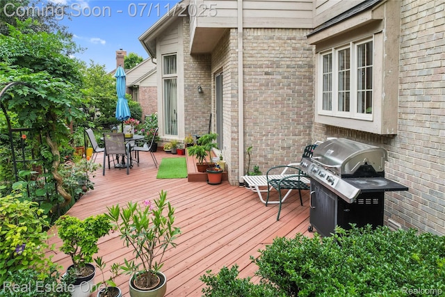 3565 Heron Ridge Dr, Rochester Hills, MI 48309 - deck with a grill and outdoor dining area