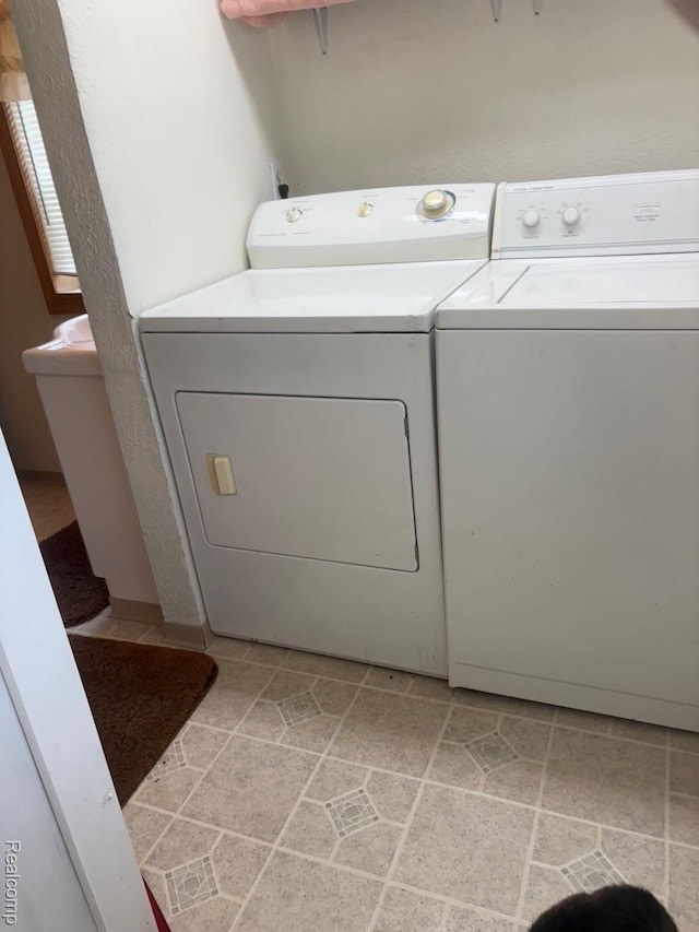 1023 Lakewood Dr, East Tawas, MI 48730 - washroom with independent washer and dryer