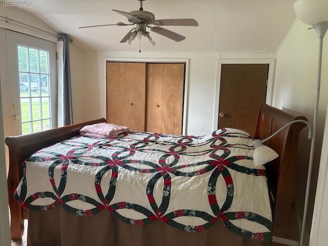 1023 Lakewood Dr, East Tawas, MI 48730 - bedroom featuring a closet, a ceiling fan, and lofted ceiling