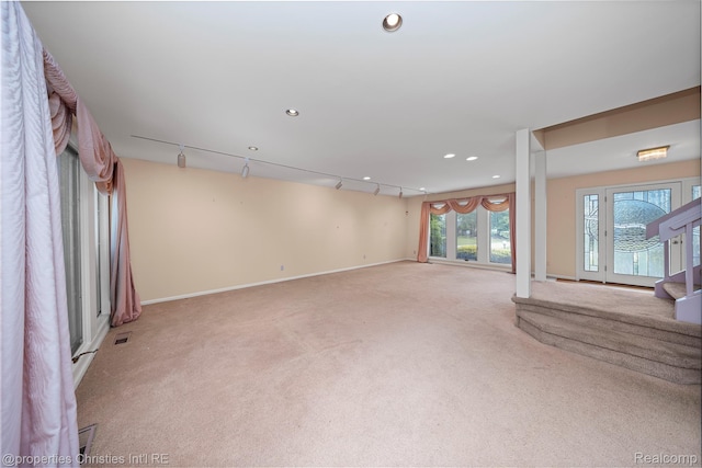 4724 Tara Ct, West Bloomfield, MI 48323 - unfurnished living room with carpet, recessed lighting, and stairs