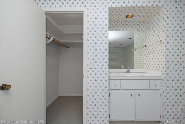 4724 Tara Ct, West Bloomfield, MI 48323 - bathroom featuring wallpapered walls and vanity