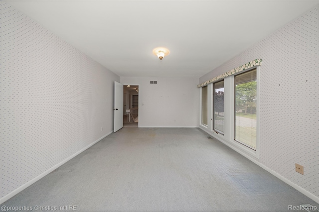 4724 Tara Ct, West Bloomfield, MI 48323 - spare room featuring wallpapered walls and carpet flooring