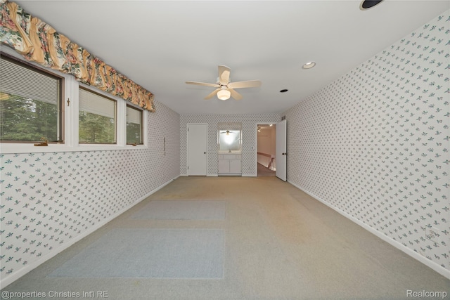 4724 Tara Ct, West Bloomfield, MI 48323 - empty room with wallpapered walls, ceiling fan, carpet floors, and recessed lighting