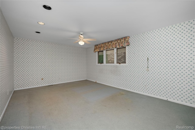 4724 Tara Ct, West Bloomfield, MI 48323 - empty room with wallpapered walls, a ceiling fan, and carpet