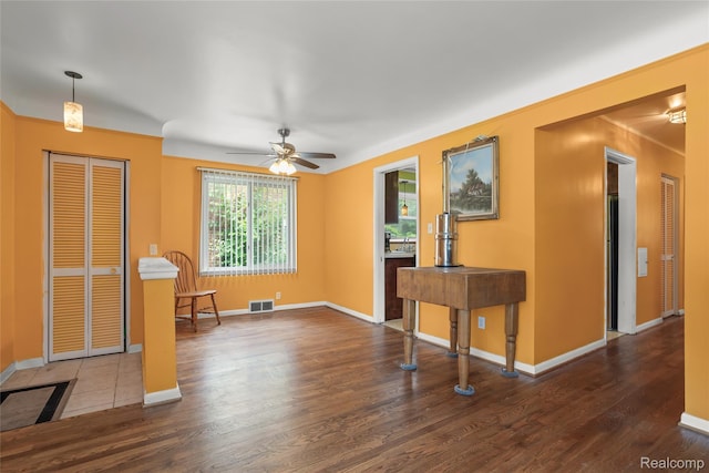 928 N Denwood St, Dearborn, MI 48128 - empty room with wood finished floors and ceiling fan