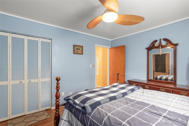 928 N Denwood St, Dearborn, MI 48128 - bedroom with a closet, wood finished floors, and a ceiling fan