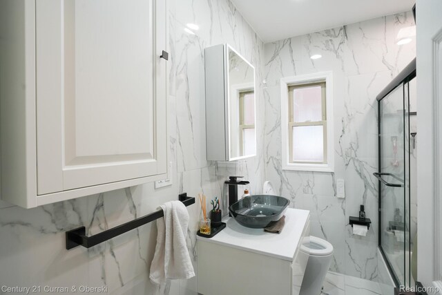 5720 Argyle St, Dearborn, MI 48126 - full bath featuring vanity, a marble finish shower, tile walls, and marble finish flooring