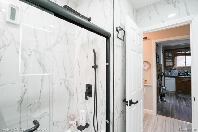 5720 Argyle St, Dearborn, MI 48126 - full bathroom featuring a marble finish shower, vanity, and wood finished floors