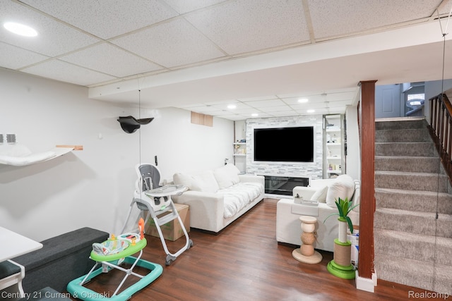 5720 Argyle St, Dearborn, MI 48126 - living room with wood finished floors, a drop ceiling, stairs, recessed lighting, and built in features