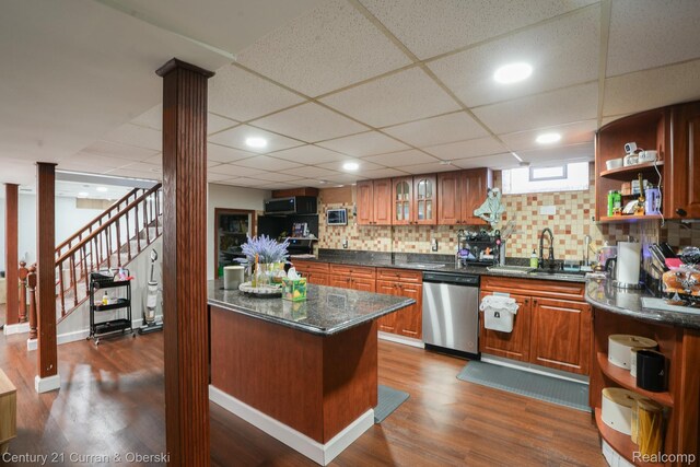 5720 Argyle St, Dearborn, MI 48126 - kitchen with stainless steel appliances, open shelves, dark wood-type flooring, brown cabinets, and recessed lighting