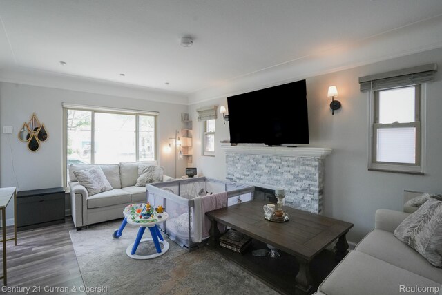 5720 Argyle St, Dearborn, MI 48126 - living area with wood finished floors and a glass covered fireplace