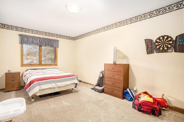 6580 Sunflower Dr SW, Byron Center, MI 49315 - carpeted bedroom featuring baseboards