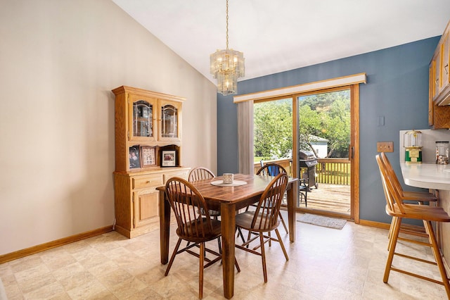 6580 Sunflower Dr SW, Byron Center, MI 49315 - dining area featuring a chandelier and high vaulted ceiling