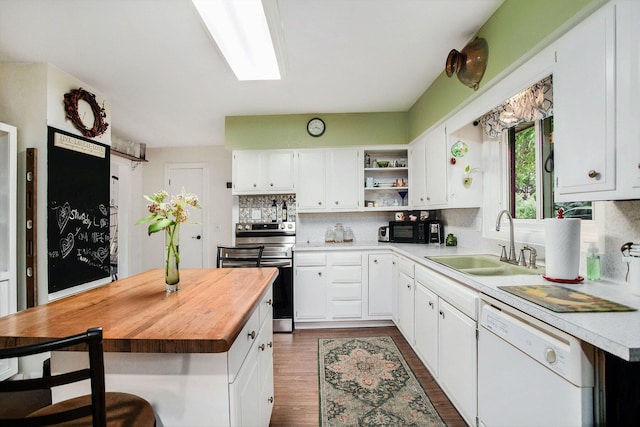 12972 S M 43 Hwy, Delton, MI 49046 - kitchen featuring dishwasher, stainless steel electric range, butcher block counters, open shelves, and decorative backsplash