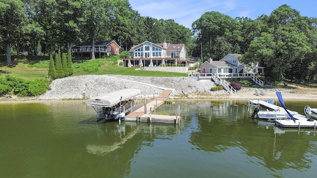 481 Seminole Rd, Norton Shores, MI 49444 - dock with a water view and boat lift