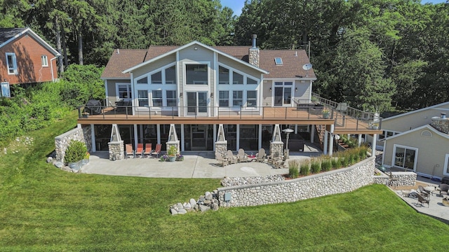 481 Seminole Rd, Norton Shores, MI 49444 - back of house with a patio, a wooden deck, a lawn, and stairs